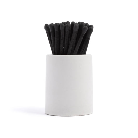 White Round Vessel with All Black Matchsticks